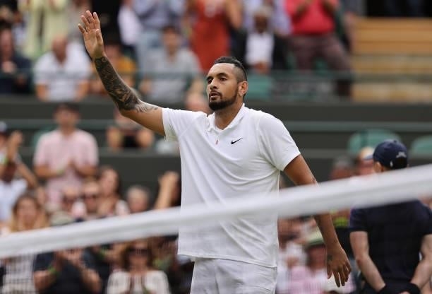 Nick Kyrgios of Australia interacts with the crowd after retiring injured during his men's singles third round match against Felix Auger Aliassime of...
