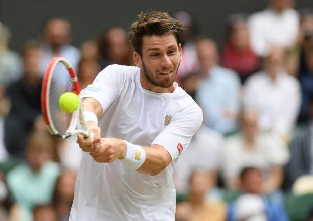 Cameron Norrie of Great Britain plays a forehand during his men's singles third round match against Roger Federer of Switzerland during Day Six of...