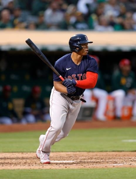 Rafael Devers of the Boston Red Sox bats against the Oakland Athletics at RingCentral Coliseum on July 02, 2021 in Oakland, California.