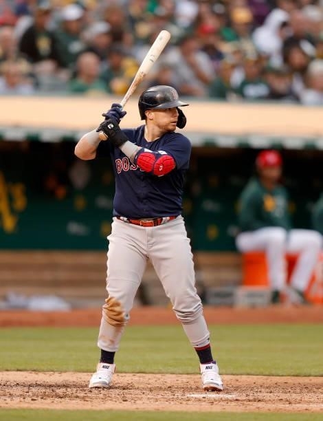 Christian Vazquez of the Boston Red Sox bats against the Oakland Athletics at RingCentral Coliseum on July 02, 2021 in Oakland, California.