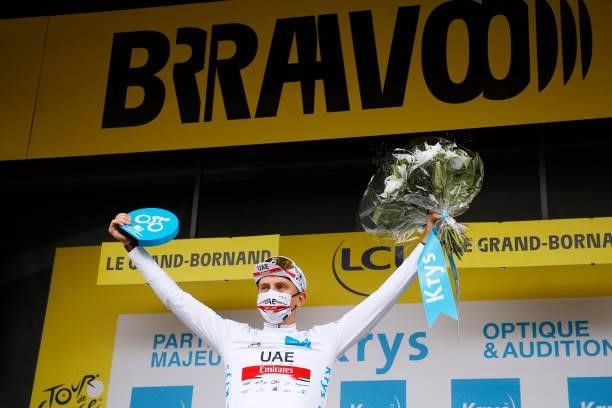 Tadej Pogačar of Slovenia and UAE-Team Emirates White Best Young Rider Jersey celebrates at podium during the 108th Tour de France 2021, Stage 8 a...