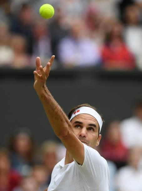 Roger Federer of Switzerland serves during his men's singles third round match against Cameron Norrie of Great Britain during Day Six of The...