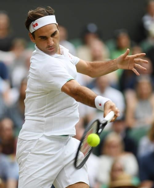 Roger Federer of Switzerland plays a forehand during his men's singles third round match against Cameron Norrie of Great Britain during Day Six of...