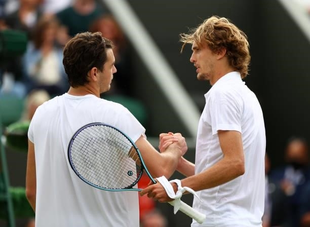 Alexander Zverev of Germany interacts with Taylor Fritz of United States after victory in his men's singles third round match during Day Six of The...