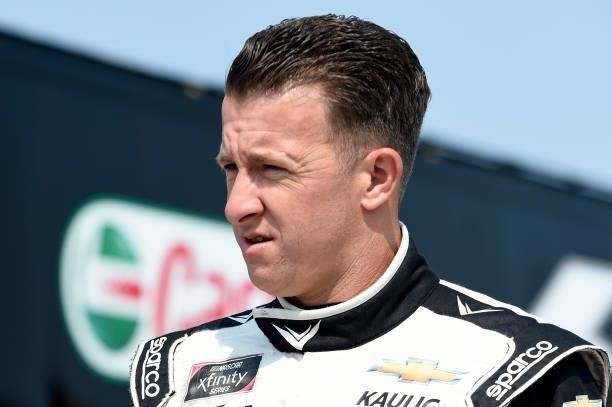 Allmendinger, driver of the Hyperice Chevrolet, walks the grid during the NASCAR Xfinity Series Henry 180 at Road America on July 03, 2021 in Elkhart...