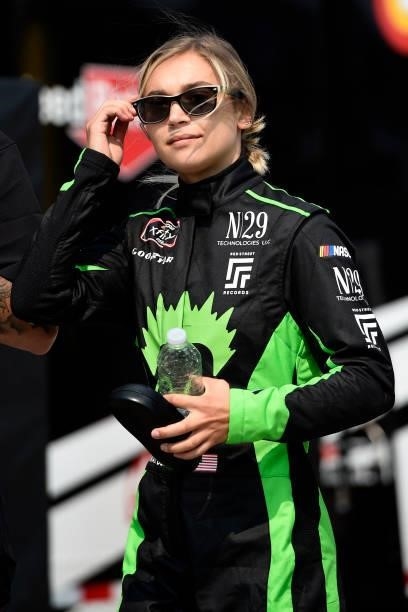 Natalie Decker, driver of the NERD Focus Chevrolet, walks the grid during the NASCAR Xfinity Series Henry 180 at Road America on July 03, 2021 in...