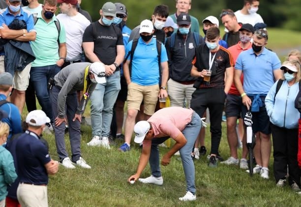 Christiaan Bezuidenhout of South Africa takes a drop on the 18th hole during Day Three of The Dubai Duty Free Irish Open at Mount Juliet Golf Club on...