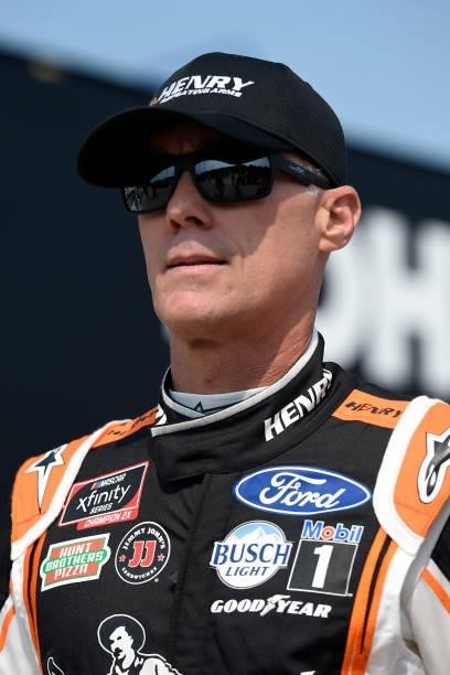 Kevin Harvick, driver of the Henry Repeating Arms Ford, walks the grid during the NASCAR Xfinity Series Henry 180 at Road America on July 03, 2021 in...