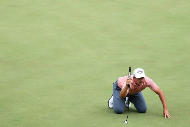 Christiaan Bezuidenhout of South Africa line up his putt the18th green during Day Three of The Dubai Duty Free Irish Open at Mount Juliet Golf Club...
