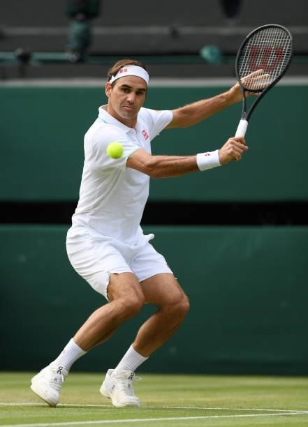 Roger Federer of Switzerland plays a backhand during his men's singles third round match against Cameron Norrie of Great Britain during Day Six of...
