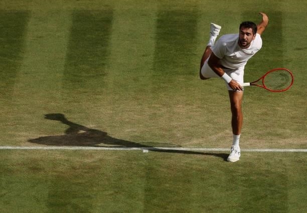 Marin Cilic of Croatia serves during his men's singles third round match against Daniil Medvedev of Russia during Day Six of The Championships -...