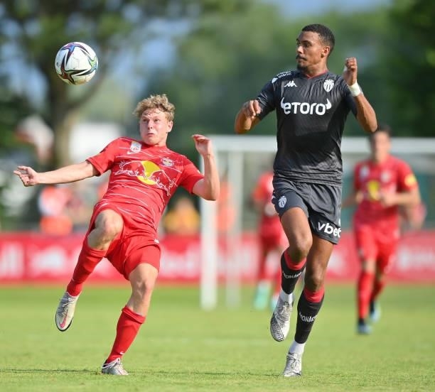 Kilian Ludewig of FC Red Bull Salzburg and Wilson Isidor of AS Monaco compete for the ball during the Pre-Season Friendly match between FC Red Bull...
