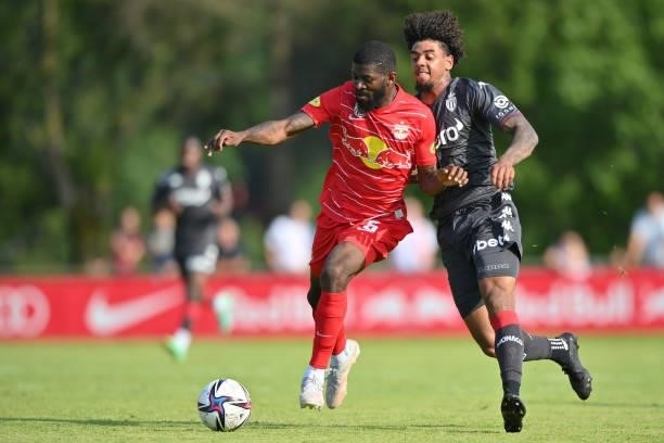 Jerome Onguene of FC Red Bull Salzburg and Willem Geubbels of AS Monaco compete for the ball during the Pre-Season Friendly match between FC Red Bull...