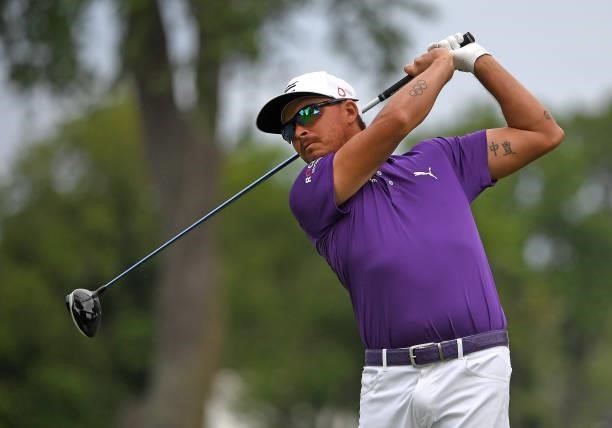 Rickie Fowler plays his shot from the second tee during the third round of the Rocket Mortgage Classic on July 03, 2021 at the Detroit Golf Club in...