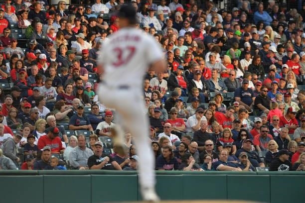 Fans watch pitcher Trevor Stephan of the Cleveland Indians during the fourth inning against the Houston Astros at Progressive Field on July 02, 2021...