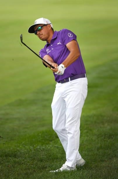 Rickie Fowler plays his shot on the second hole during the third round of the Rocket Mortgage Classic on July 03, 2021 at the Detroit Golf Club in...