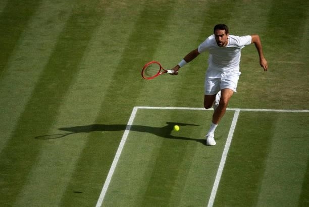 Marin Cilic of Croatia serves during his men's singles third round match against Daniil Medvedev of Russia during Day Six of The Championships -...