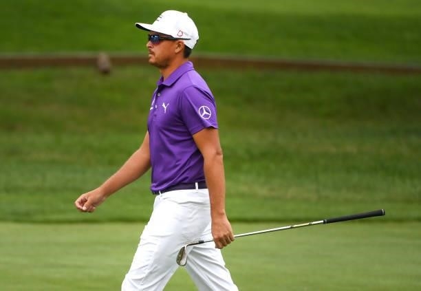 Rickie Fowler walks along the second hole during the third round of the Rocket Mortgage Classic on July 03, 2021 at the Detroit Golf Club in Detroit,...