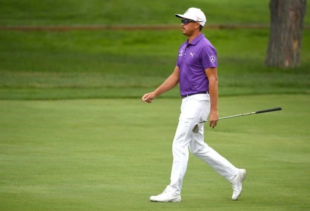 Rickie Fowler walks along the second hole during the third round of the Rocket Mortgage Classic on July 03, 2021 at the Detroit Golf Club in Detroit,...