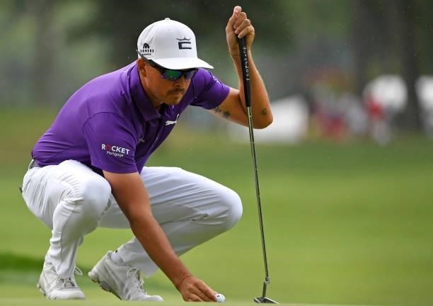 Rickie Fowler lines up a putt on the first hole during the third round of the Rocket Mortgage Classic on July 03, 2021 at the Detroit Golf Club in...