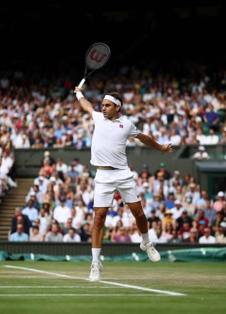 Roger Federer of Switzerland plays a backhand during his men's singles third round match against Cameron Norrie of Great Britain during Day Six of...