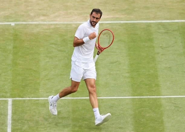 Marin Cilic of Croatia celebrates a point during his men's singles third round match against Daniil Medvedev of Russia during Day Six of The...