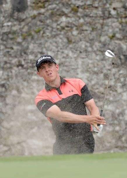 Grant Forrest of Scotland plays from the green-side bunker on the 16th hole during Day Three of The Dubai Duty Free Irish Open at Mount Juliet Golf...