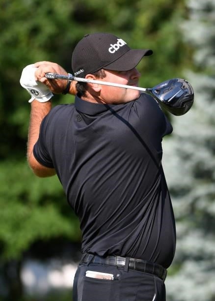 Patrick Reed plays his shot from the fourth tee during the third round of the Rocket Mortgage Classic on July 03, 2021 at the Detroit Golf Club in...