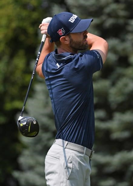 Kevin Tway plays his shot from the fourth tee during the third round of the Rocket Mortgage Classic on July 03, 2021 at the Detroit Golf Club in...