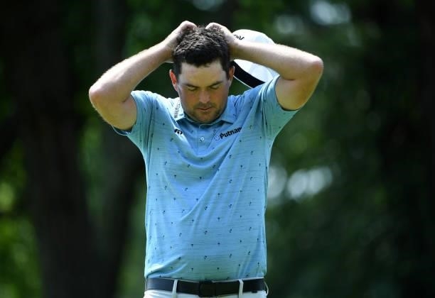 Keegan Bradley reacts to his putt on the third hole during the third round of the Rocket Mortgage Classic on July 03, 2021 at the Detroit Golf Club...
