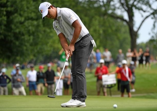 Si-Woo Kim of South Korea reacts to his putt on the third green during the third round of the Rocket Mortgage Classic on July 03, 2021 at the Detroit...