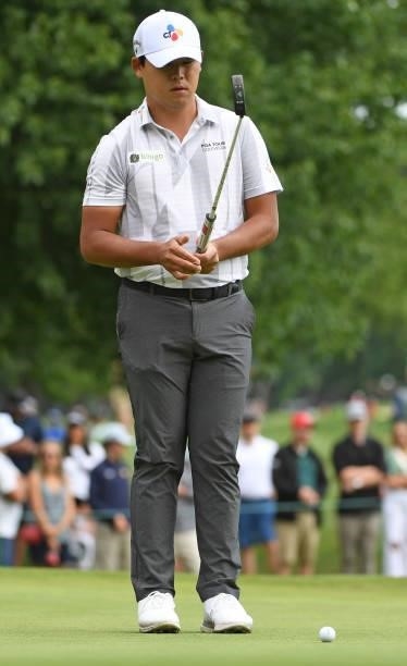 Si-Woo Kim of South Korea prepares to putt on the third green during the third round of the Rocket Mortgage Classic on July 03, 2021 at the Detroit...