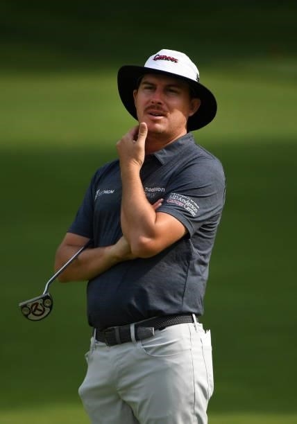 Joel Dahmen reacts to a missed putt on the third green during the third round of the Rocket Mortgage Classic on July 03, 2021 at the Detroit Golf...