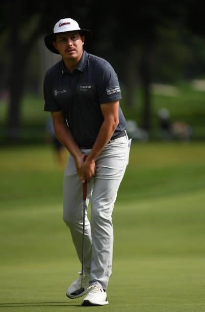 Joel Dahmen reacts to a missed putt on the third green during the third round of the Rocket Mortgage Classic on July 03, 2021 at the Detroit Golf...