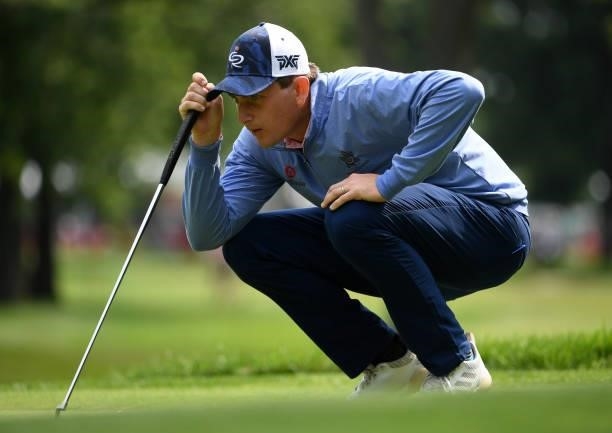 Henrik Norlander of Sweden lines up a putt on the third green during the third round of the Rocket Mortgage Classic on July 03, 2021 at the Detroit...