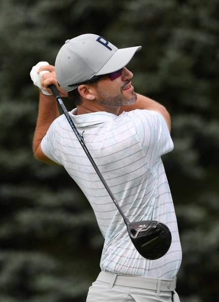 Chris Baker plays his shot from the fourth tee during the third round of the Rocket Mortgage Classic on July 03, 2021 at the Detroit Golf Club in...