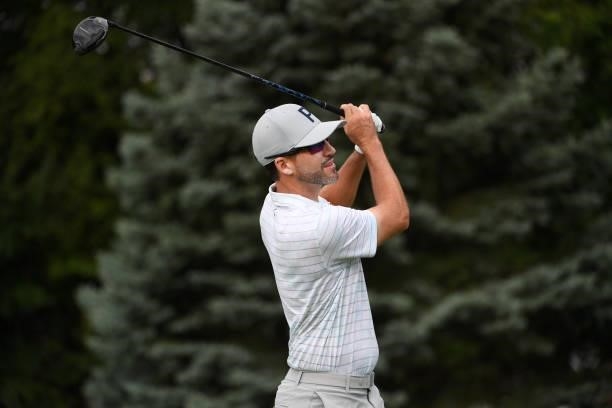 Chris Baker plays his shot from the fourth tee during the third round of the Rocket Mortgage Classic on July 03, 2021 at the Detroit Golf Club in...