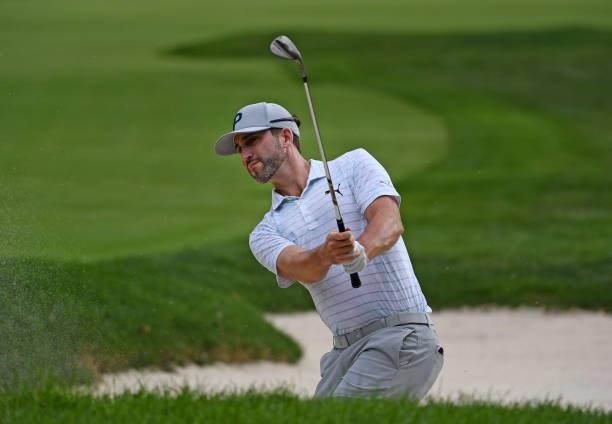 Chris Baker plays a shot from a bunker on the third hole during the third round of the Rocket Mortgage Classic on July 03, 2021 at the Detroit Golf...