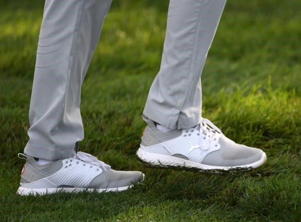The shoes of Chris Baker on the second hole during the third round of the Rocket Mortgage Classic on July 03, 2021 at the Detroit Golf Club in...