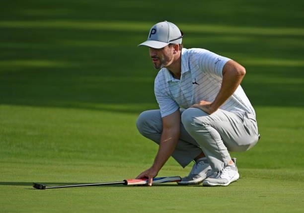 Chris Baker lines up a putt on the second green during the third round of the Rocket Mortgage Classic on July 03, 2021 at the Detroit Golf Club in...