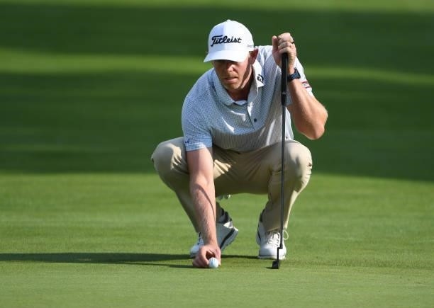 Mark Anderson lines up a putt on the second green during the third round of the Rocket Mortgage Classic on July 03, 2021 at the Detroit Golf Club in...
