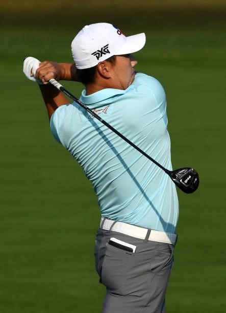 Sung Kang of South Korea plays his shot on the fourth hole during the third round of the Rocket Mortgage Classic on July 03, 2021 at the Detroit Golf...