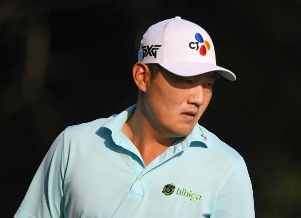 Sung Kang of South Korea reacts to his putt on the third green during the third round of the Rocket Mortgage Classic on July 03, 2021 at the Detroit...