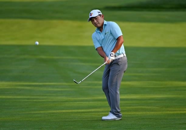 Sung Kang of South Korea chips on the second green during the third round of the Rocket Mortgage Classic on July 03, 2021 at the Detroit Golf Club in...