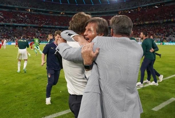 Head coach Italy Roberto Mancini celebrates with his staff after the UEFA Euro 2020 Championship Quarter-final match between Belgium and Italy at...