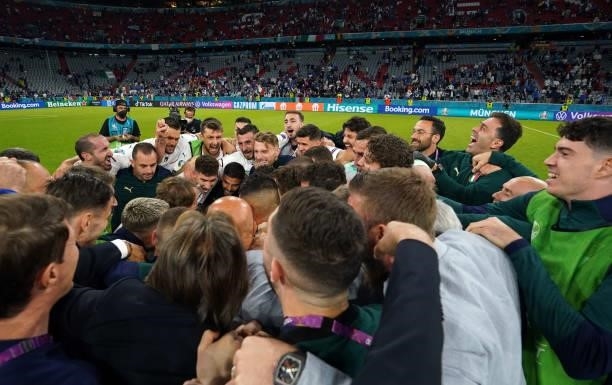 Head coach Italy Roberto Mancini celebrates with players and his staff after the UEFA Euro 2020 Championship Quarter-final match between Belgium and...