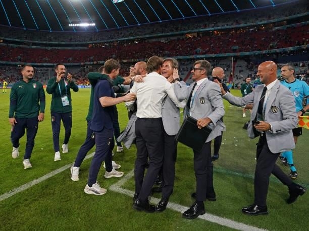 Head coach Italy Roberto Mancini celebrates with his staff after the UEFA Euro 2020 Championship Quarter-final match between Belgium and Italy at...
