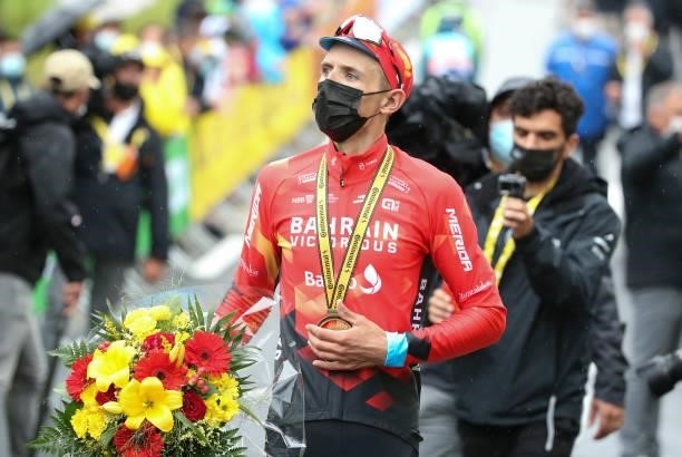 Dylan Teuns of Belgium and Bahrain Victorious celebrates during the trophy ceremony winning stage 8 of the 108th Tour de France 2021, a stage of 151...