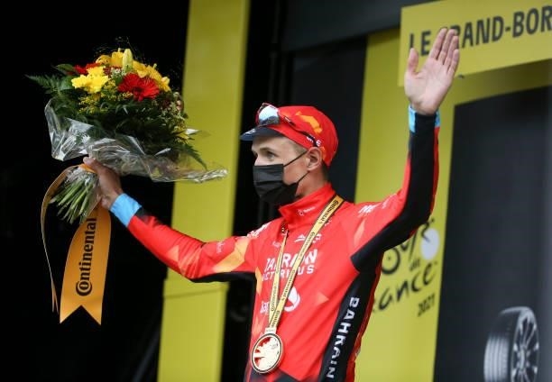 Dylan Teuns of Belgium and Bahrain Victorious celebrates during the trophy ceremony winning stage 8 of the 108th Tour de France 2021, a stage of 151...