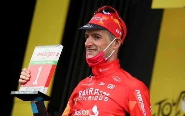 Wout Poels of Netherlands and Bahrain Victorious receives the award for best combative rider of the day during the trophy ceremony of stage 8 of the...